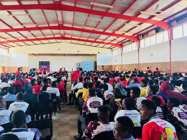 Learners facing the main stage during career talks at the 2023 exhibition