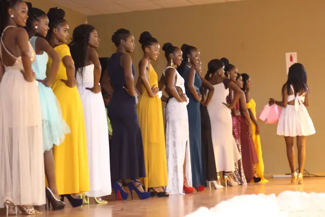 Miss Sekgosese contestants in evening gowns on stage